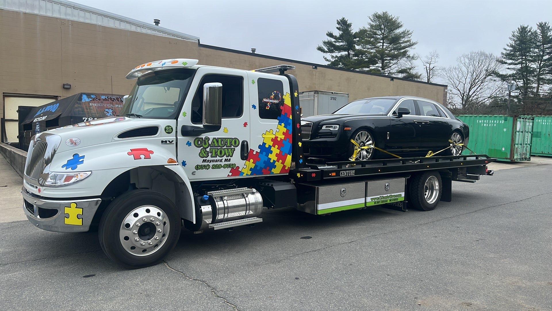 CJ Auto & Tow flatbed truck transporting a Rolls-Royce Ghost — Maynard MA
